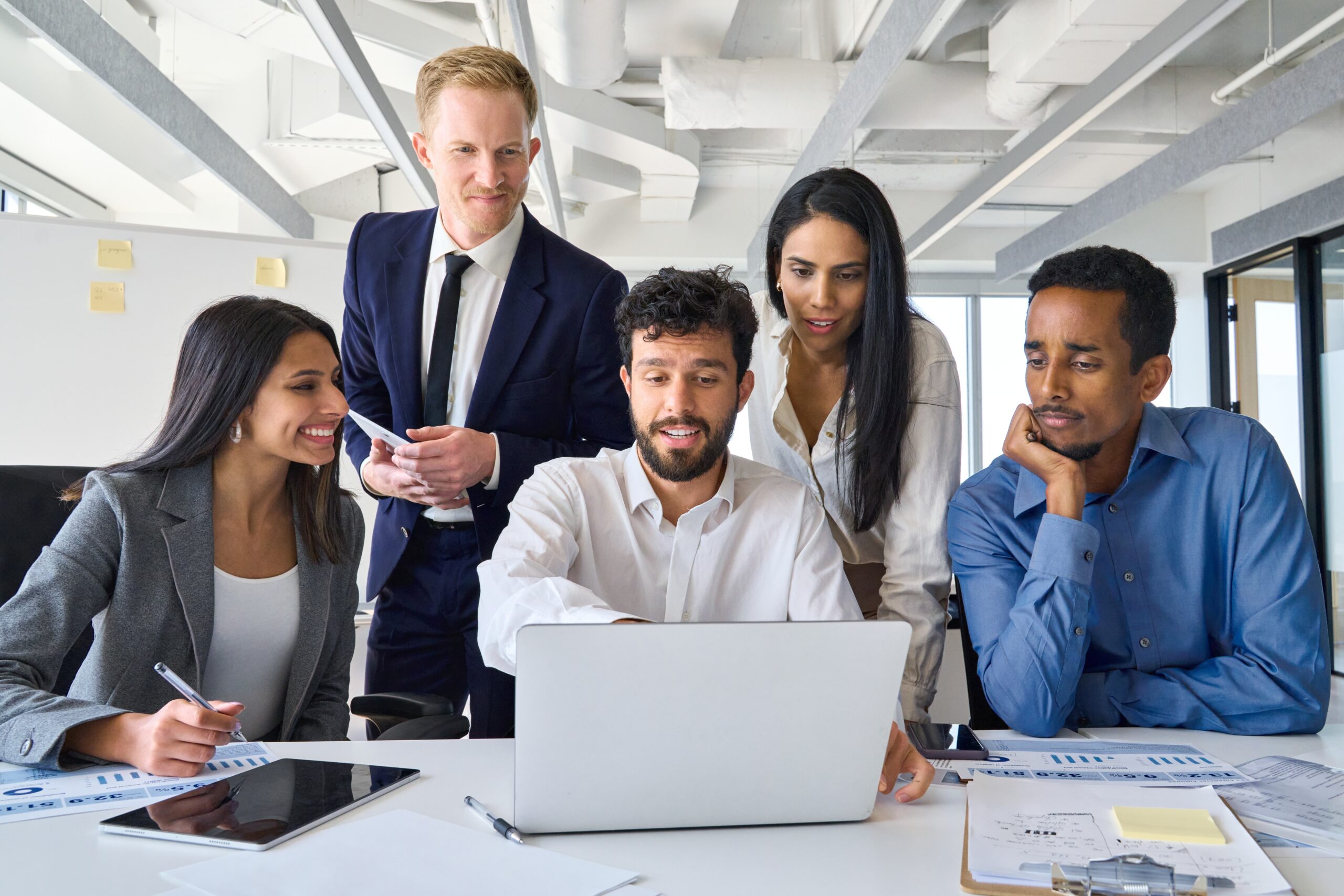 Busy,Diverse,Professional,Business,People,Executives,Looking,At,Laptop,In office colleagues